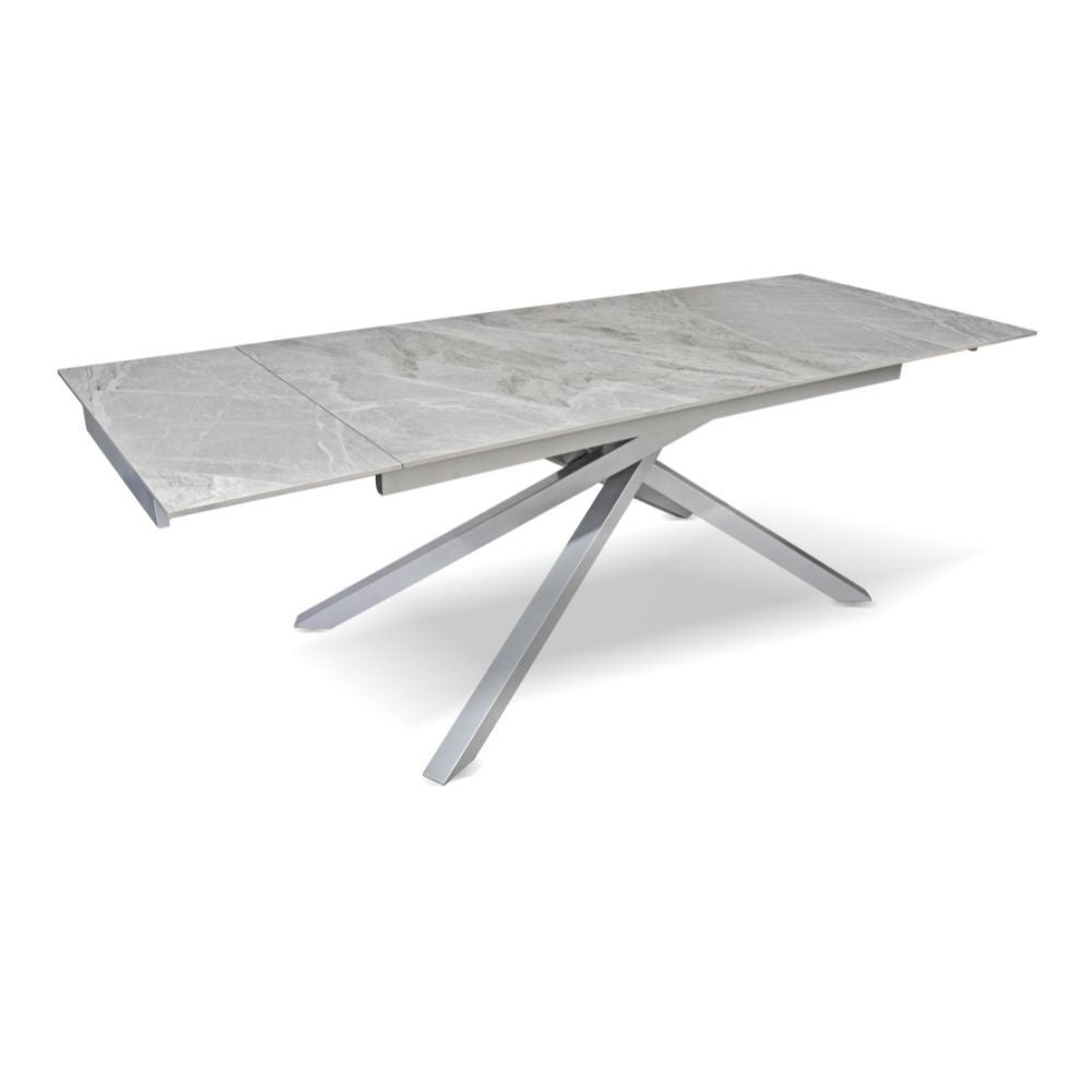 Tavolo allungabile Nefti con top in ceramica colore grigio chiaro italiano lucido con gambe argento