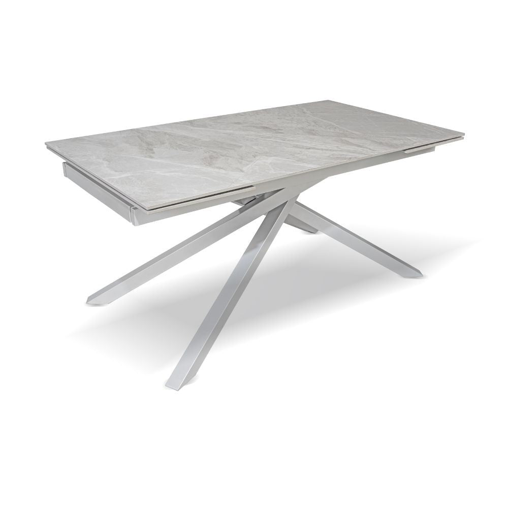 Tavolo allungabile Nefti con top in ceramica colore grigio chiaro italiano lucido con gambe argento