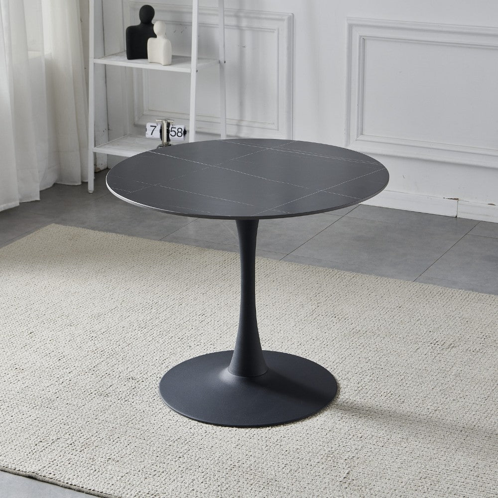Tavolo rotondo Dot con piano in ceramica effetto marmo nero opaco con particolari oro e gamba nera